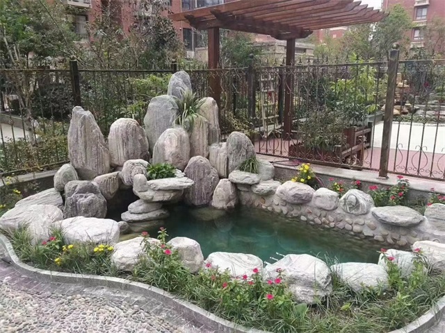 大连庭院假山鱼池制作视频